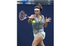 EASTBOURNE, ENGLAND - JUNE 14: Ajla Tomljanovic of Croatia plays a forehand against Jade Windley of Great Britain during their Women's Singles first round qualifying match on day one of the Aegon International at Devonshire Park on June 14, 2014 in Eastbourne, England.  (Photo by Steve Bardens/Getty Images)